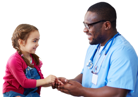 Adult male nurse holds a small girl's hand while they smile.